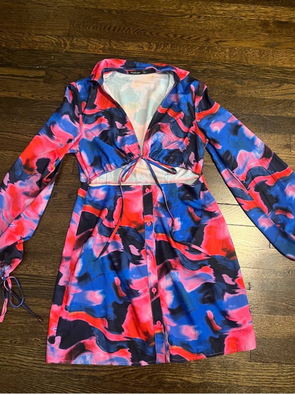 Vibrant Abstract Cut Out Low V Button-Front Long Sleeve Mini Dress